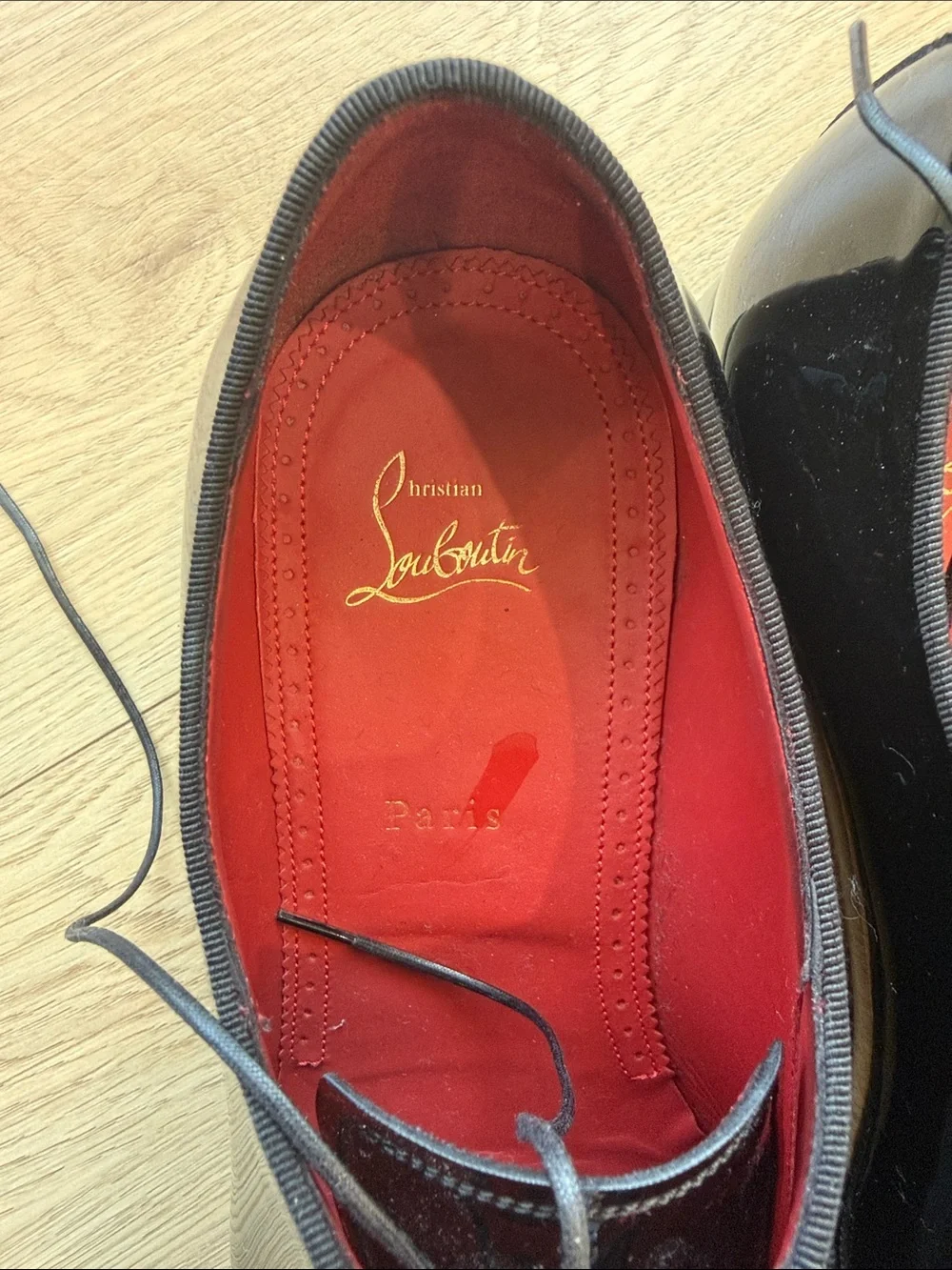 Christian Louboutin patent shoe
